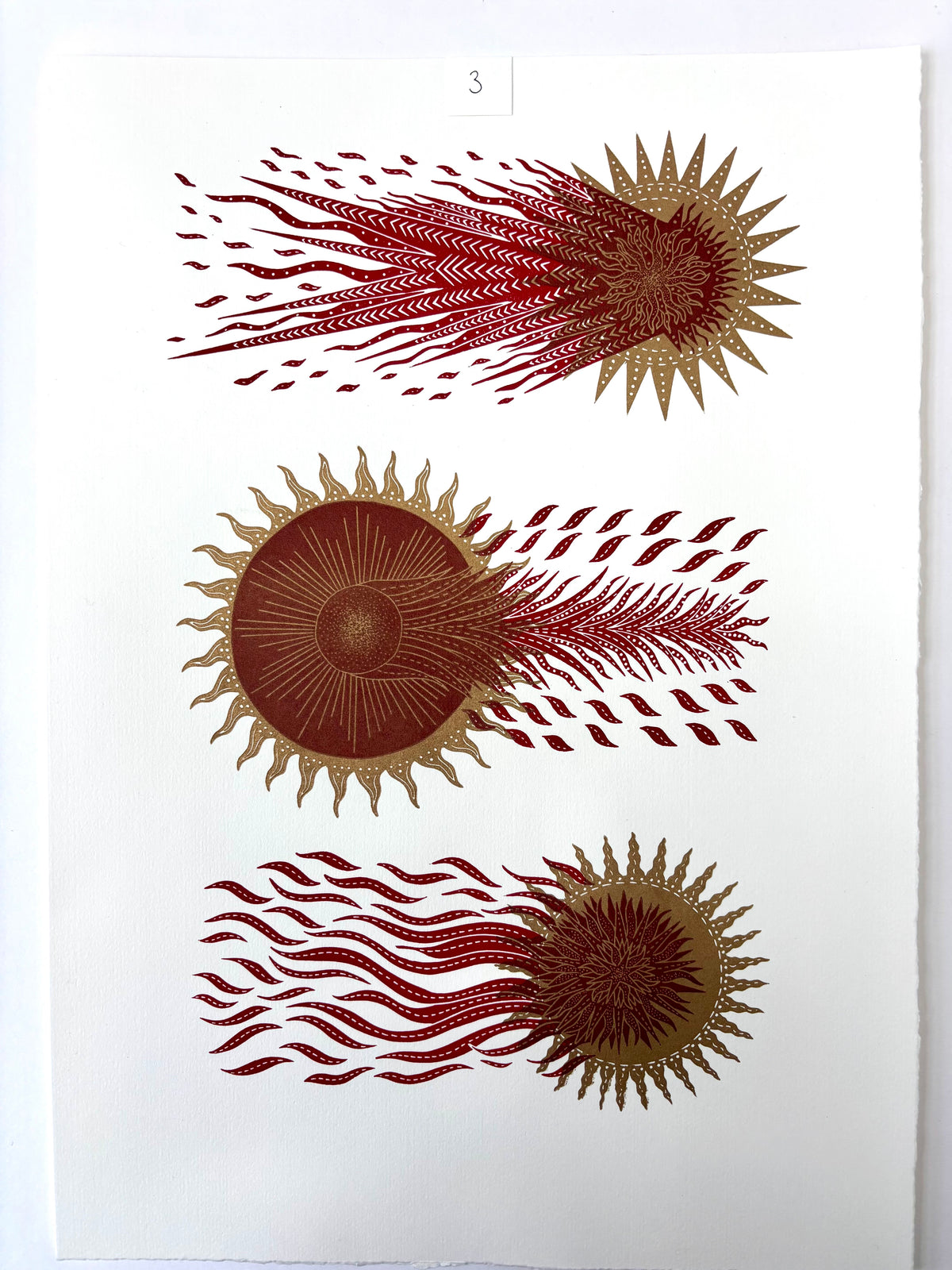 Super Seconds Festival listing: The Three Comets limited edition linoprint (red on gold)