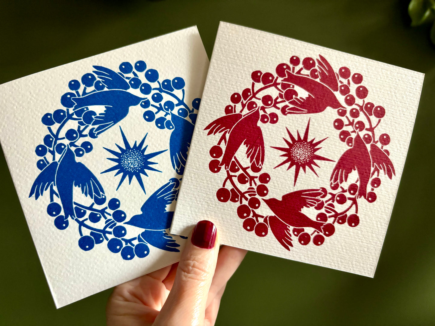 Pack of two handprinted blue and red linoprint Christmas cards