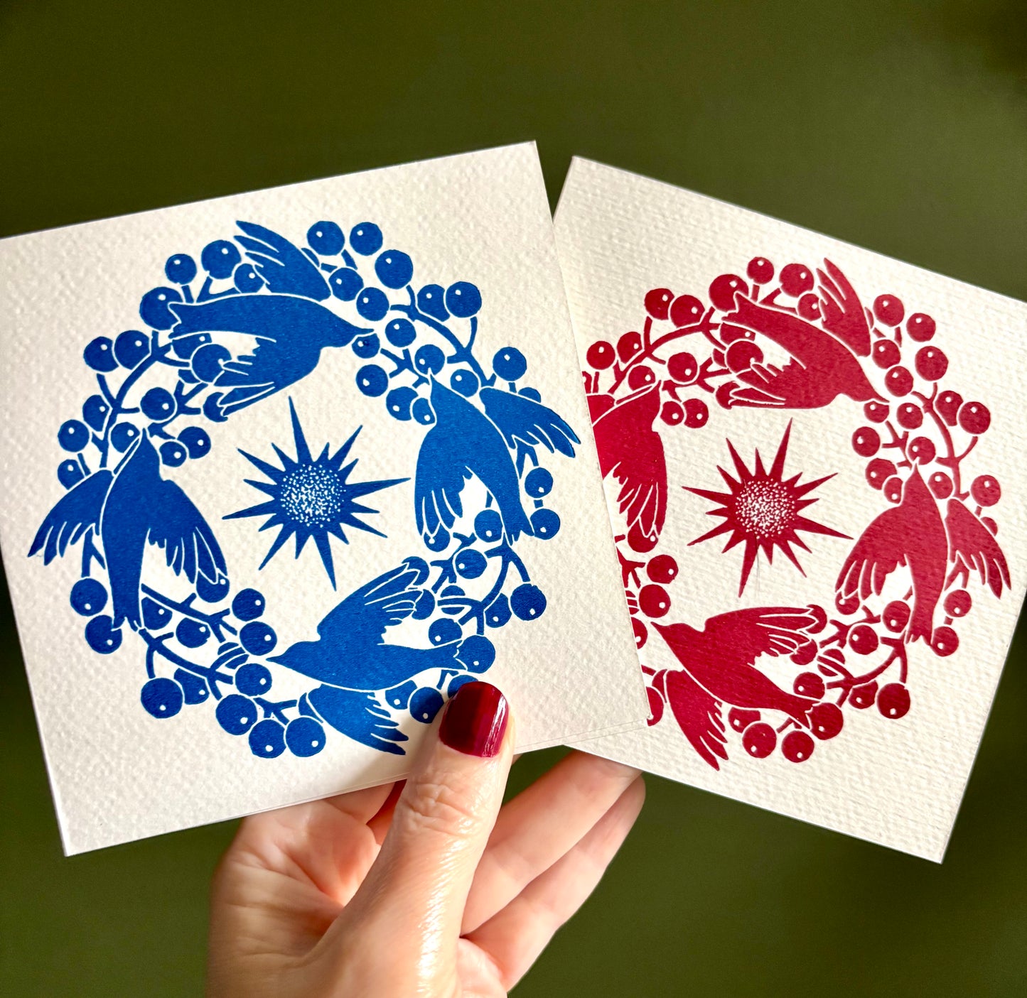 Pack of two handprinted blue and red linoprint Christmas cards